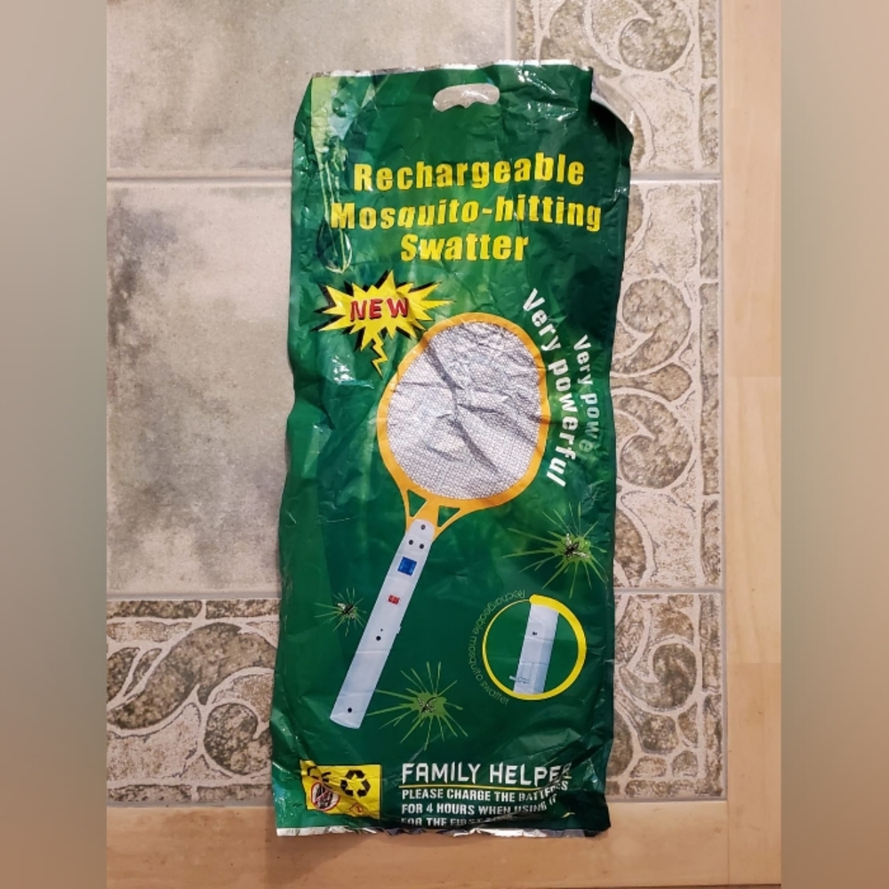 Rechargeable Mosquito-hitting Swatter. New in Bag.
